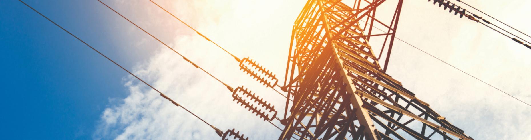 Looking up at an electricty pylon