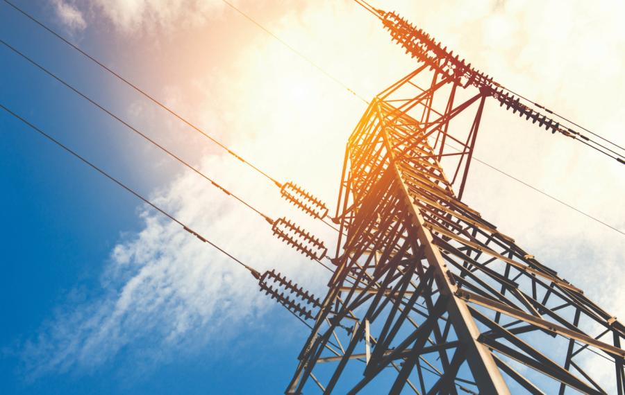Looking up at an electricty pylon