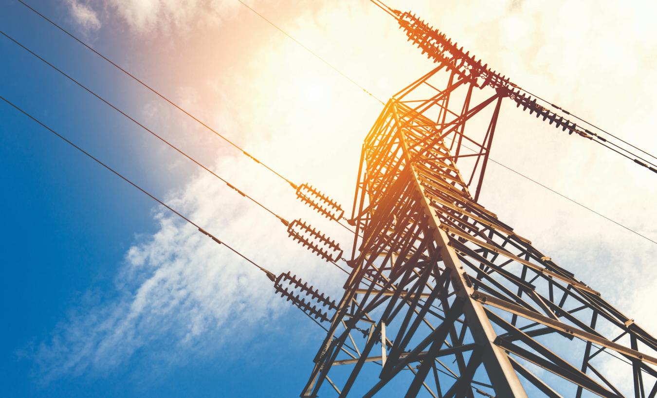 Looking up at an electricty pylon