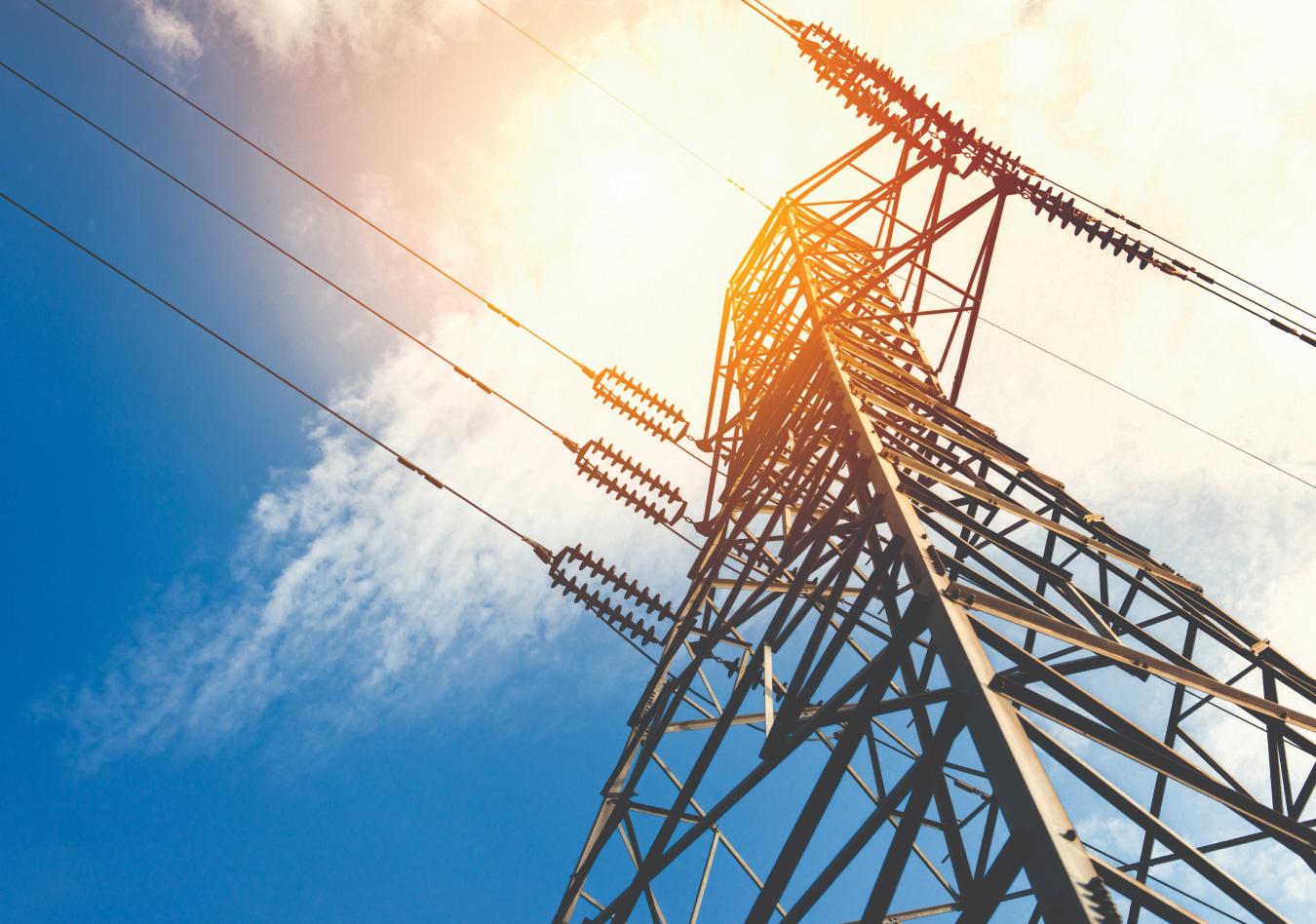 Looking up at an electricty pylon